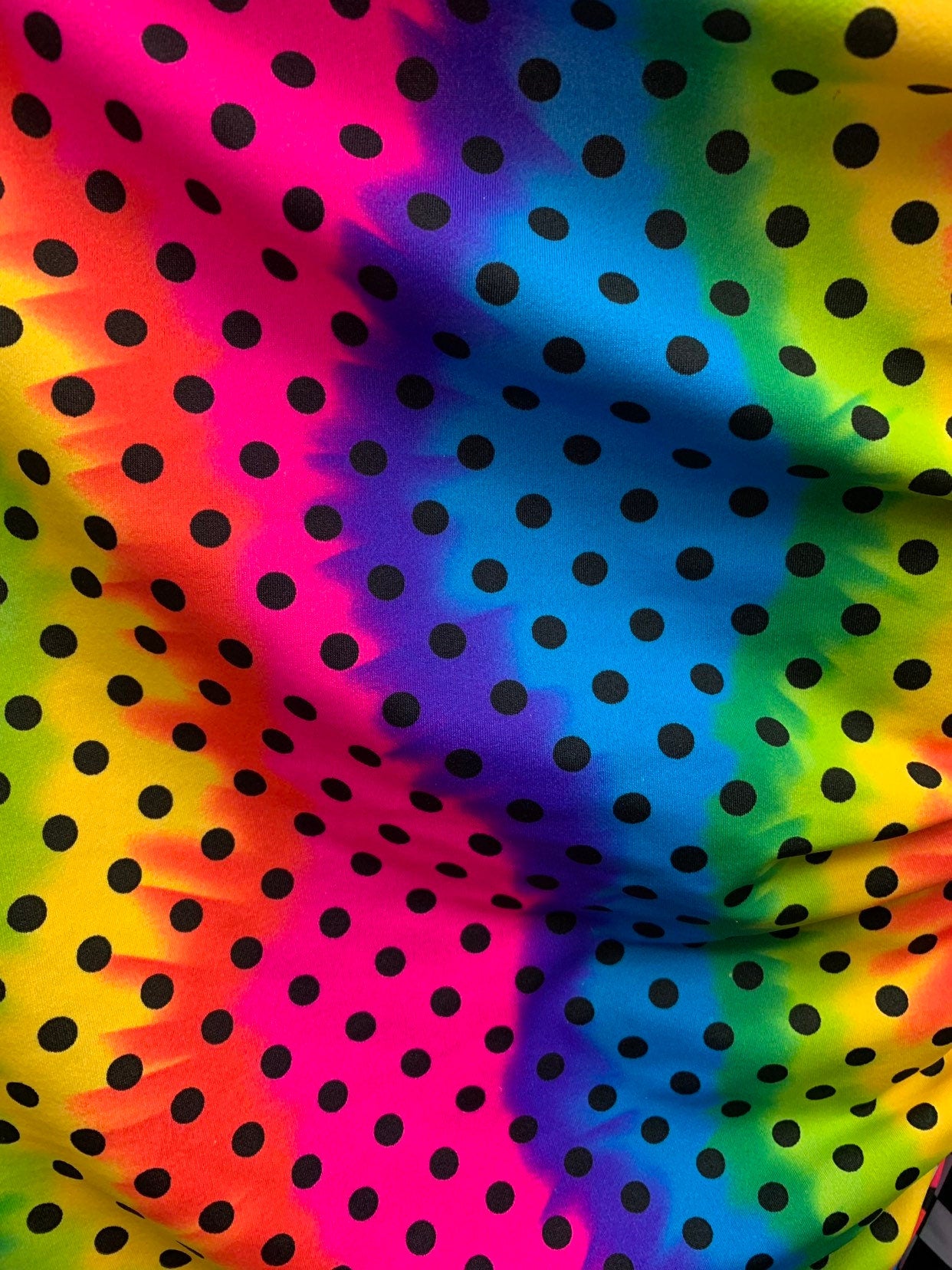 New rainbow polka dots design heavy nylon spandex 4way stretch 58/60" Sold by the YD. Ships worldwide from Los Ángeles California USA.
