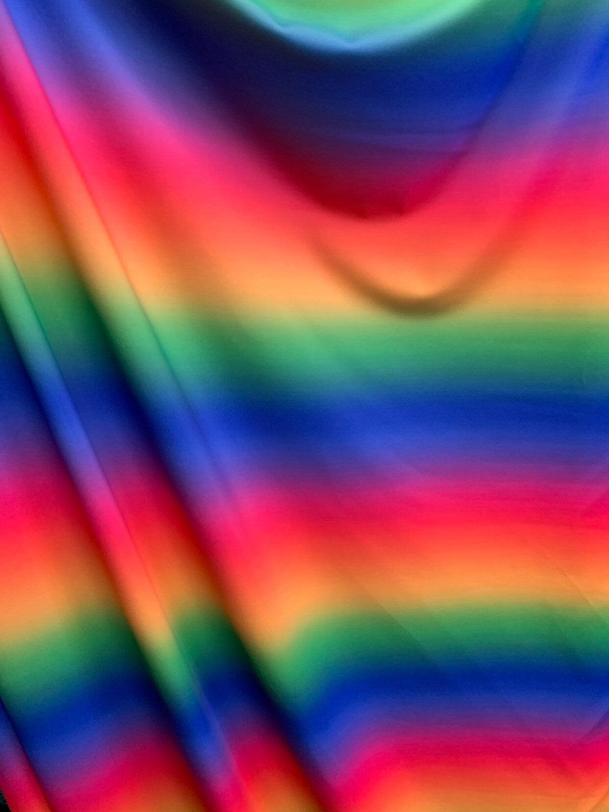 New rainbow design print on heavy nylon spandex 4way stretch 58/60" Sold by the YD. Ships worldwide from Los Angeles California USA.