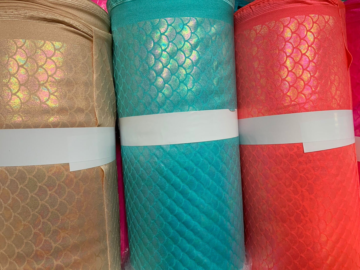 New Ilusión sirena design medium size Iridescent clear foil on nylon spandex 4way stretch 58/60" Sold by the YD. Ships worldwide from L.A CA