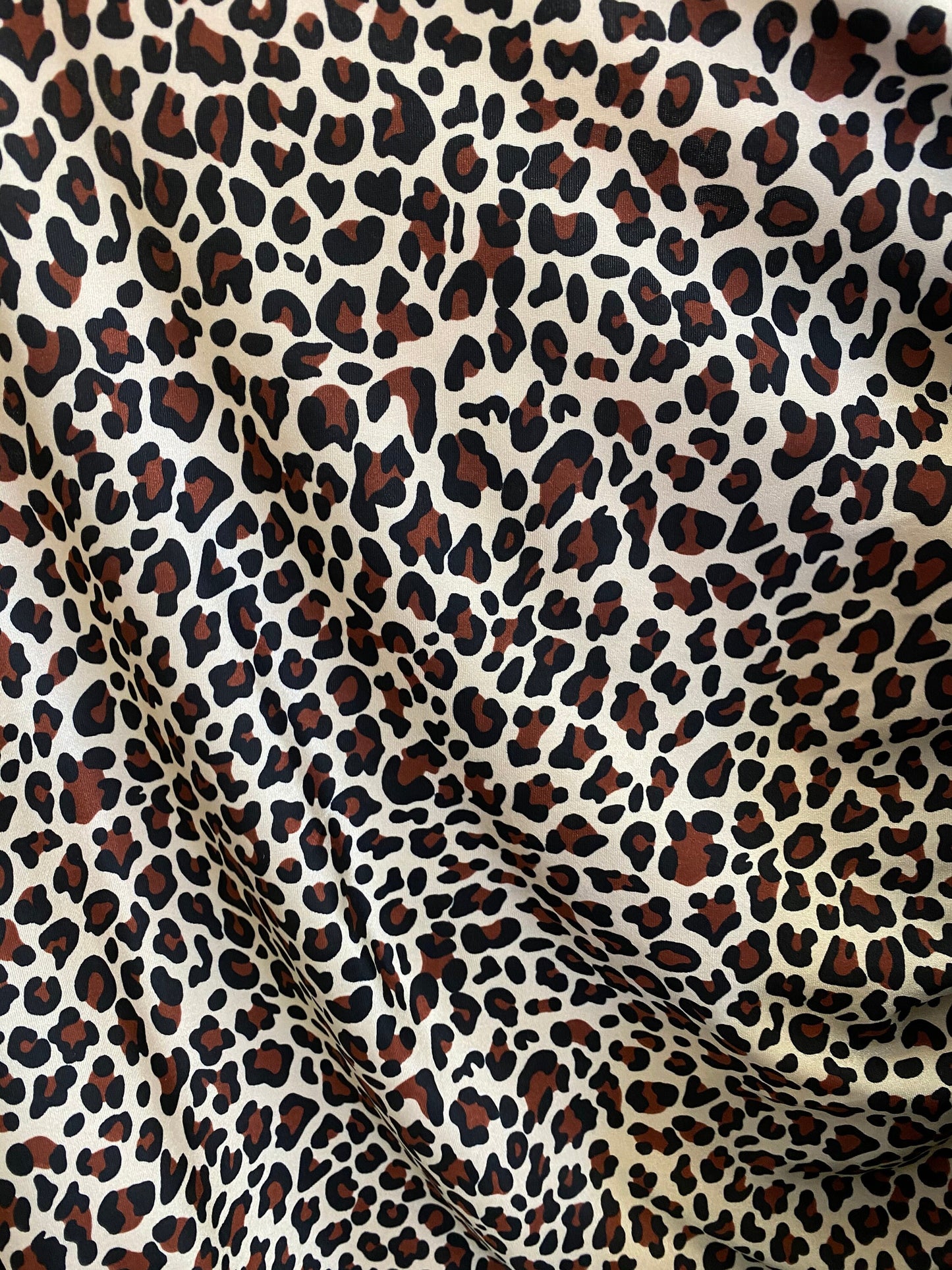 New leopard design animal print on nylon spandex 4-way 58/60” Sold by the YD. Ships worldwide from Los Angeles California USA.