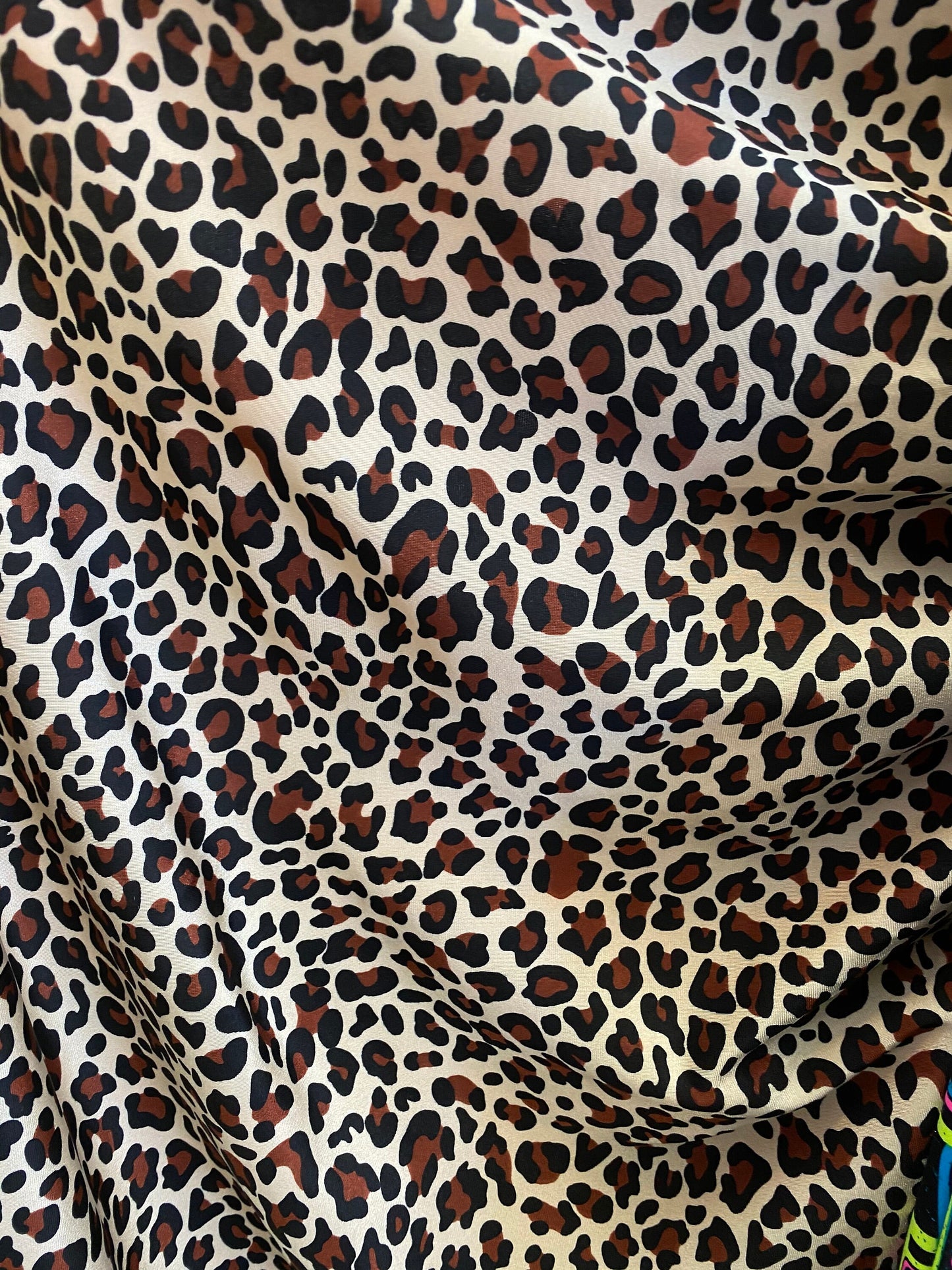 New leopard design animal print on nylon spandex 4-way 58/60” Sold by the YD. Ships worldwide from Los Angeles California USA.