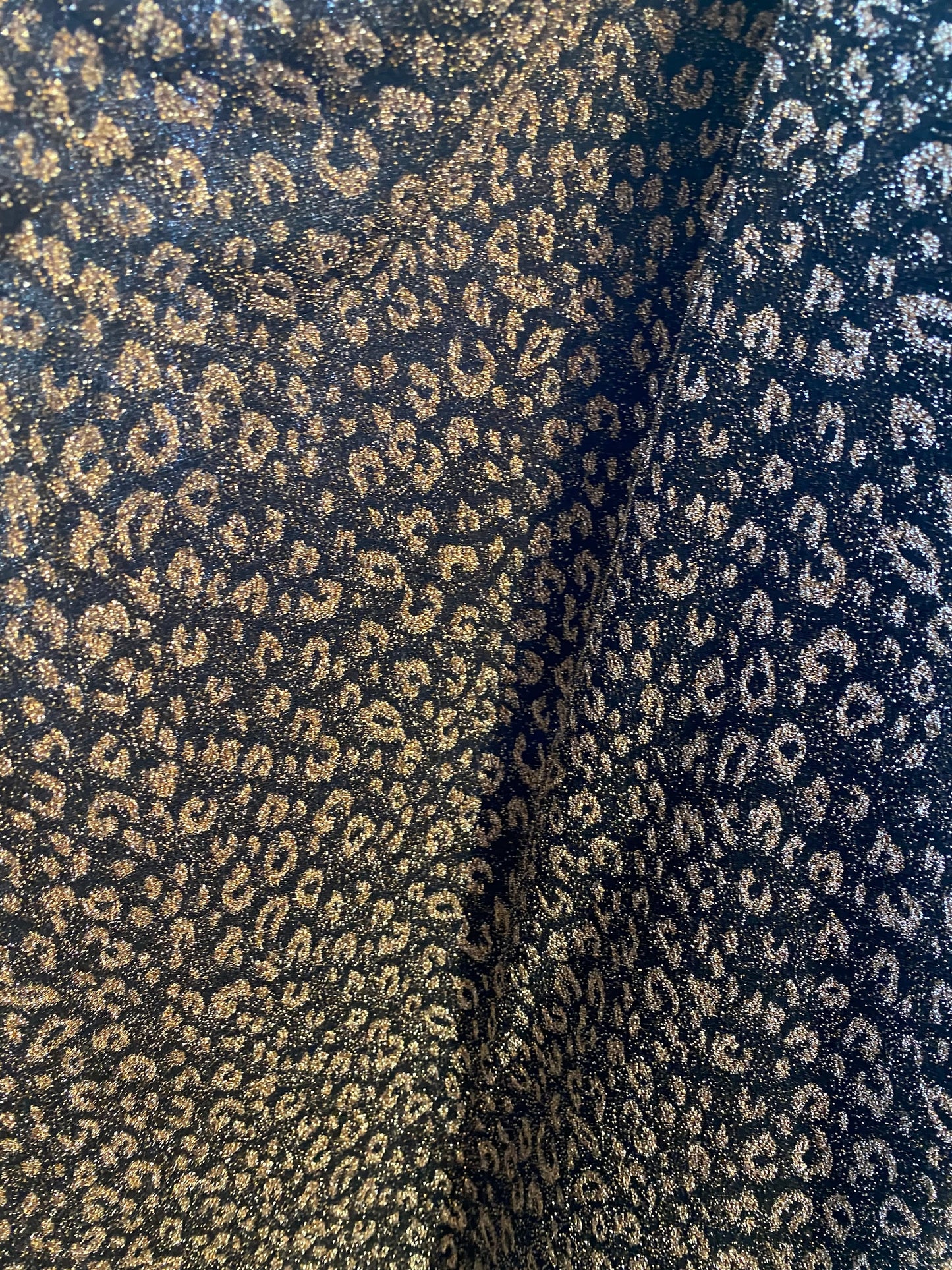 New metallic leopard design in metallic poly spandex 2-way stretch 58/60” Sold by the YD. Ships worldwide from Los Angeles California USA.