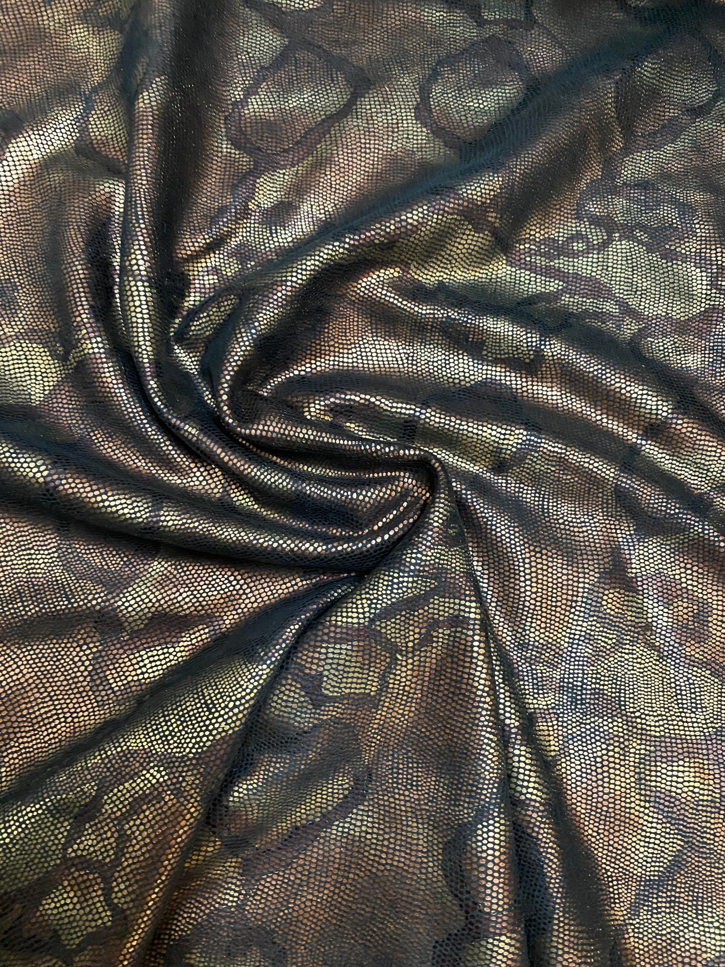 New Exotic Anaconda design print on poly stretch suede with foil 2-way stretch medium weight 58/60” Sold by the YD. Ships Worldwide