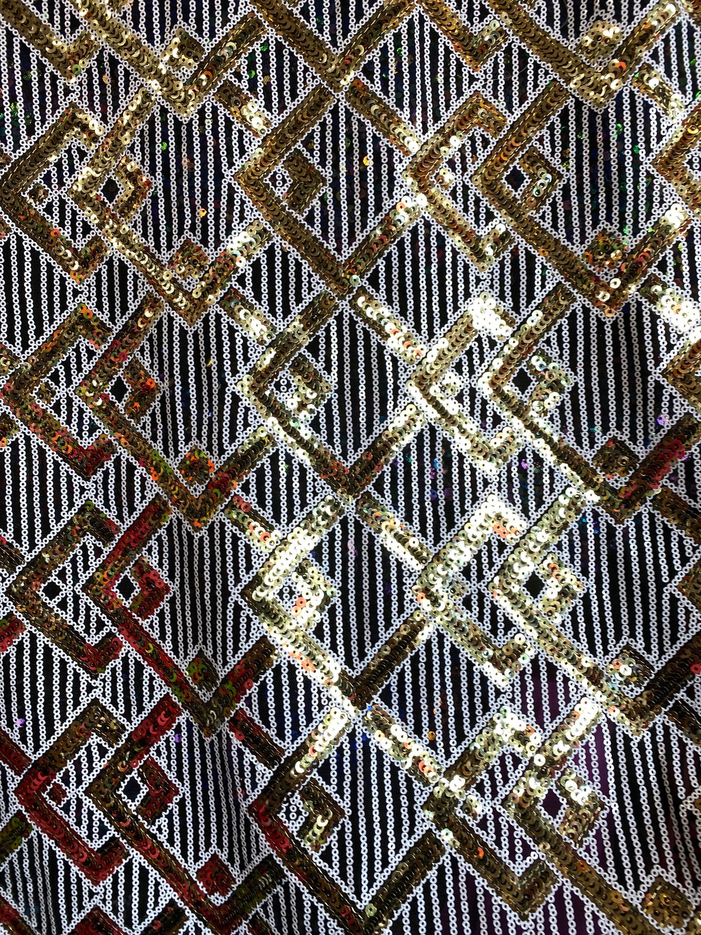 New geometric sequins Black/white/gold embroidered on stretch mesh 2-way 55/57” Sold by the YD. Ships Worldwide from Los Angeles California