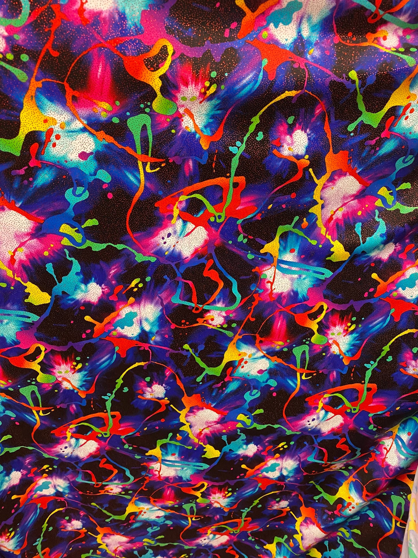 New graffiti paint design with foil nylon spandex 4-way stretch 58/60” sold by the YD. Ships worldwide from Los Angeles California USA.