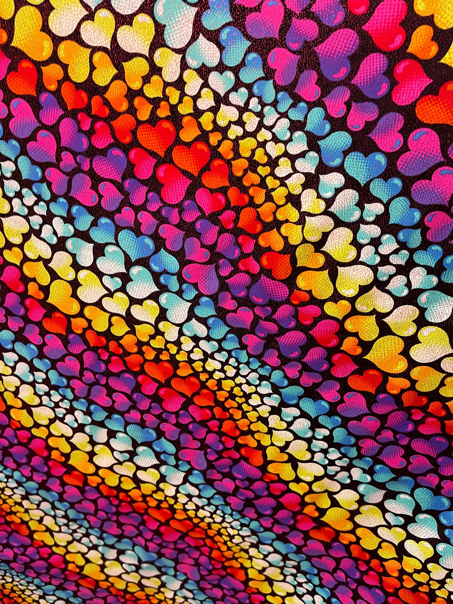 Romantic Love me Hearts design black/multicolor print on best quality of nylon spandex with foil 4-way stretch 58/60” Sold by the YD.