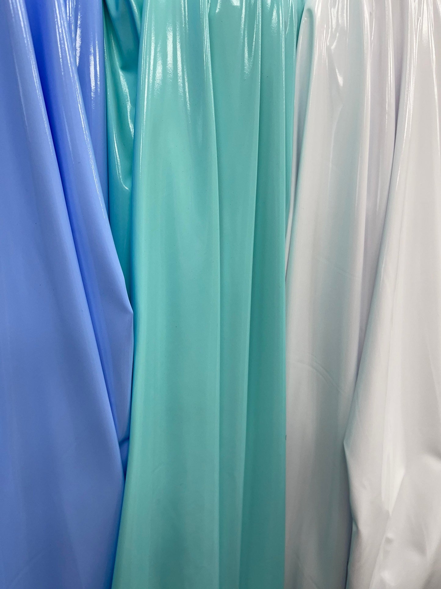 Latex super shiny vinyl 4-way stretch 58/60” Sold by the YD. Ships Worldwide from Los Angeles California.