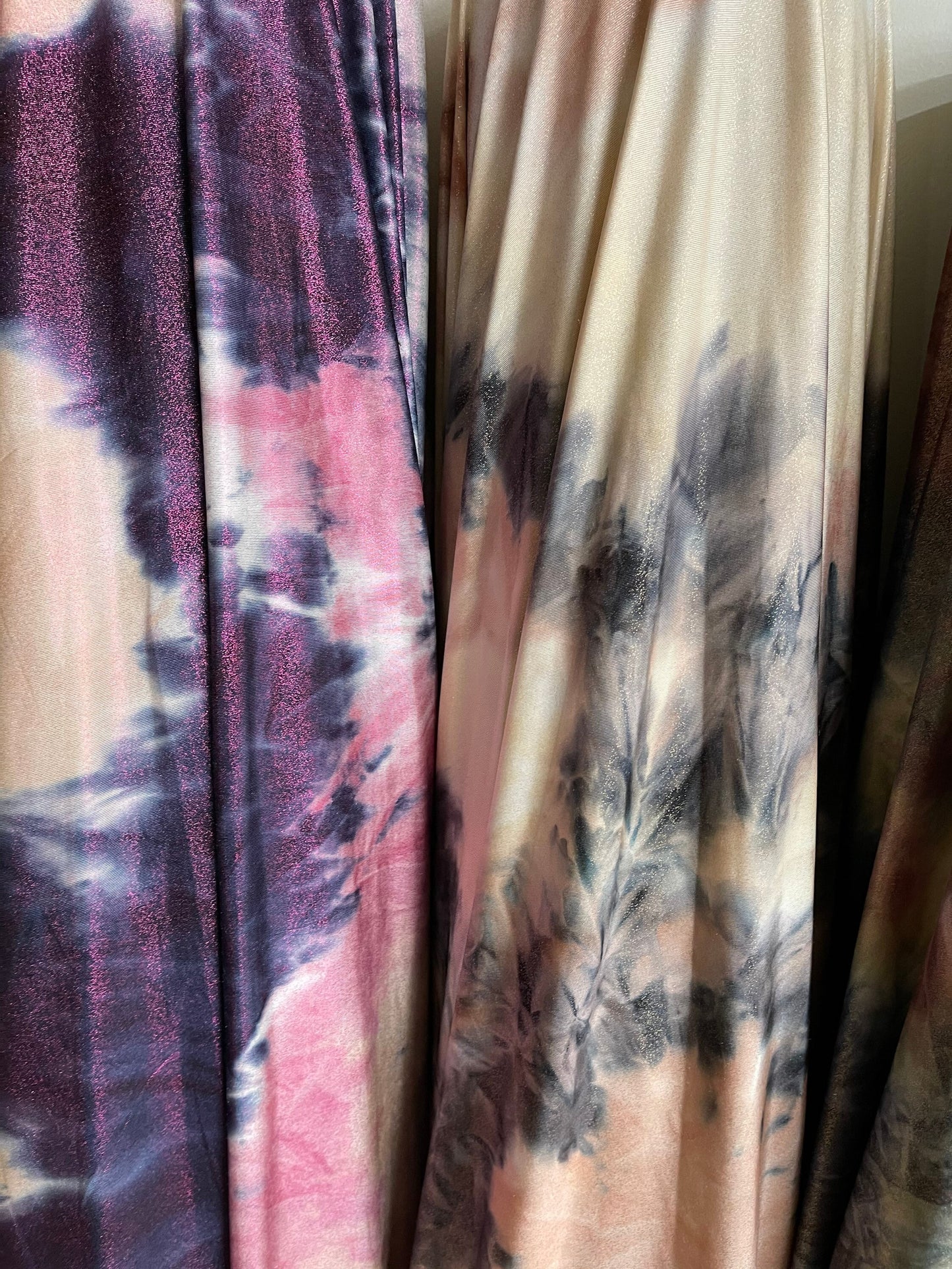 Tie dye design with foggy foil print on poly brushed spandex 2-way stretch 58/60” light weight 58/60” Sold by the YD. Ships Worldwide
