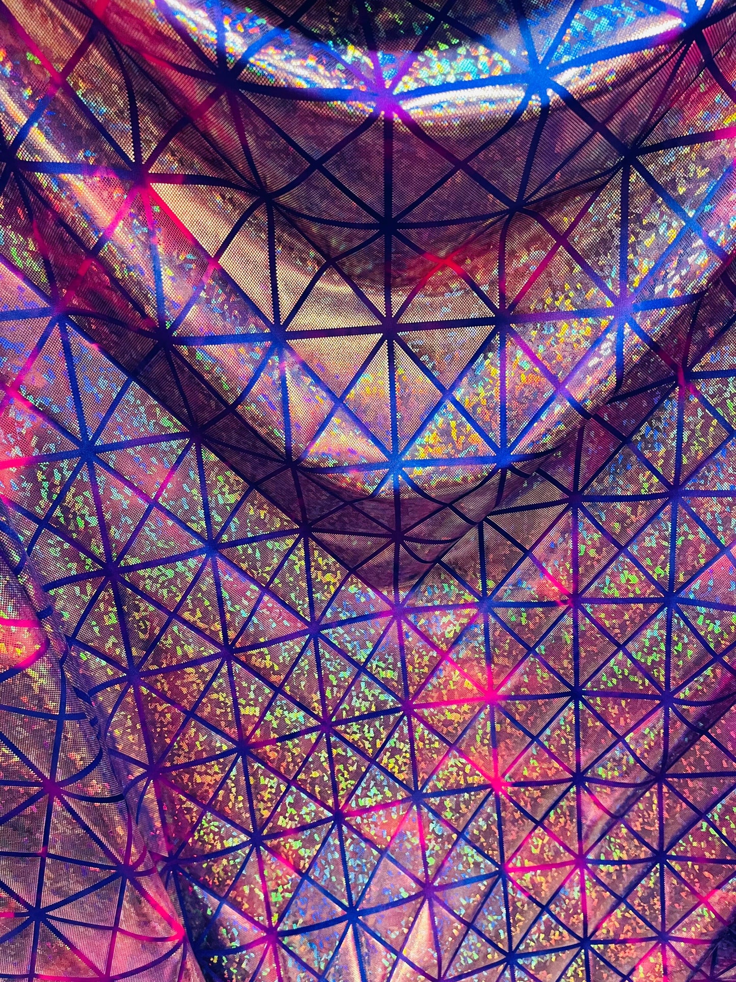 Triangles design purple/pink hologram shatter glass metallic tie dye nylon spandex 4-way stretch 58/60” Sold by the YD. Ships Worldwide