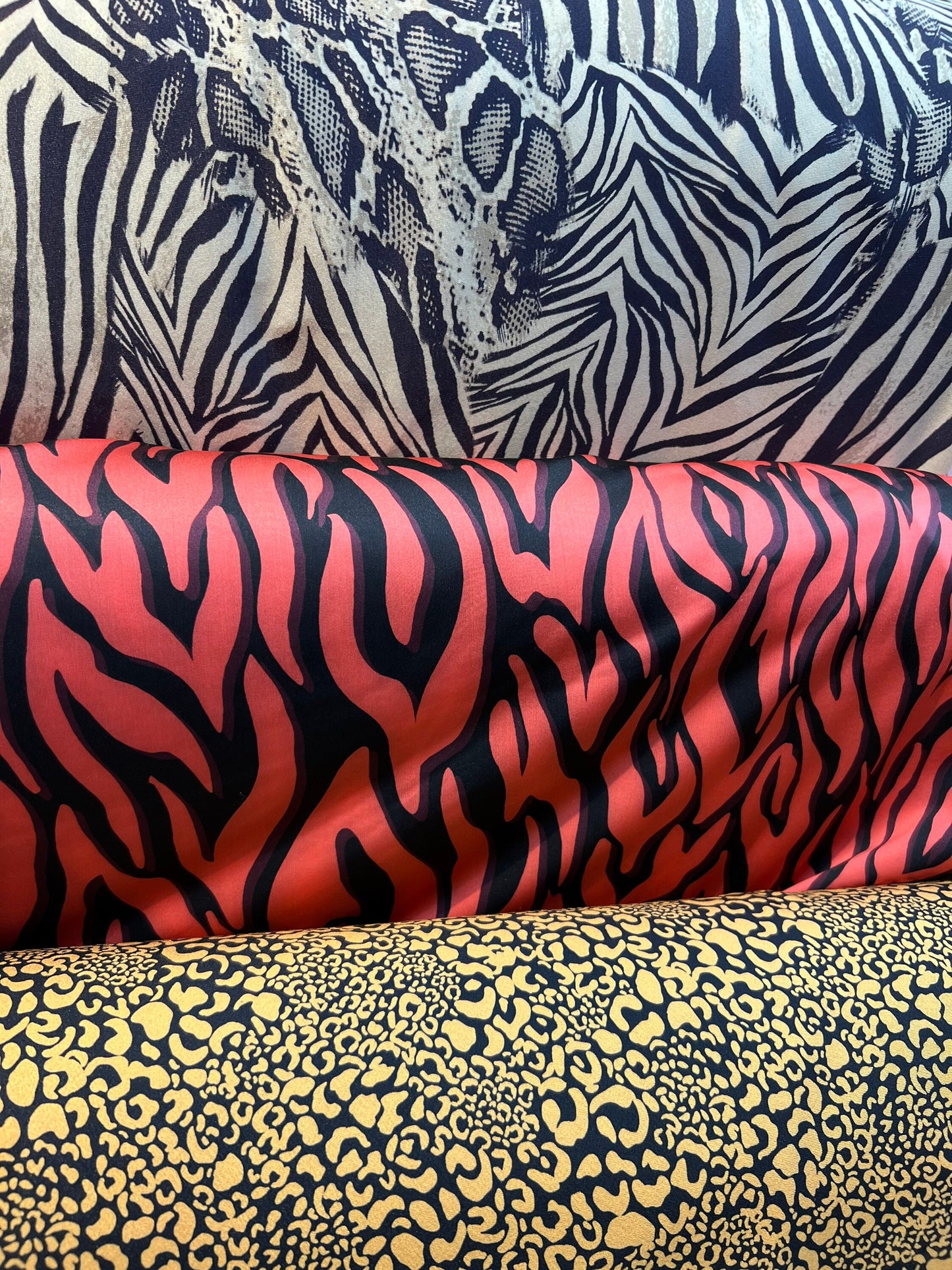 Exotics Multi animal print spandex 4-way stretch 58/60” Sold by the YD. Ships worldwide from Los Angeles California USA.