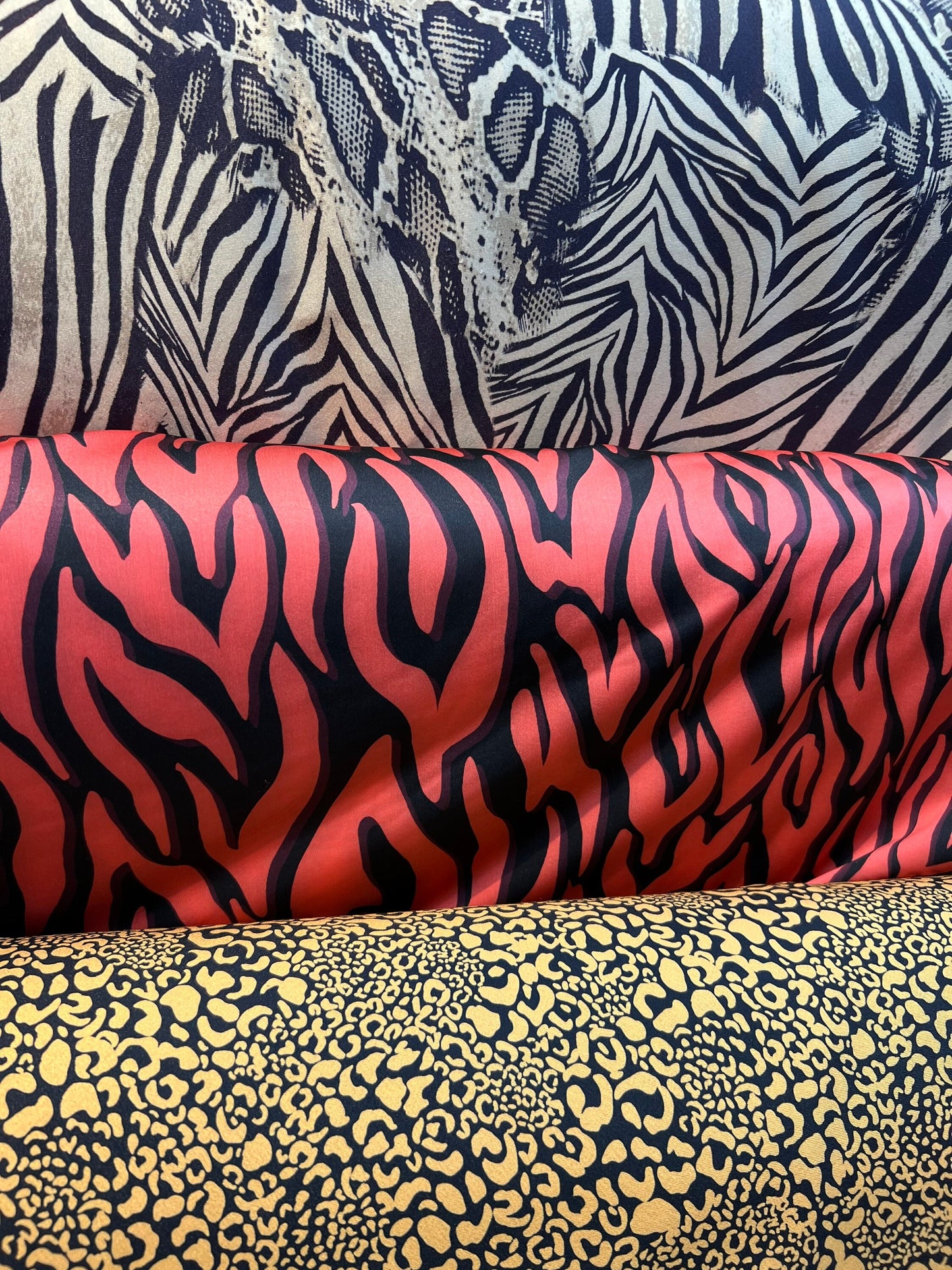 Exotics Multi animal print spandex 4-way stretch 58/60” Sold by the YD. Ships worldwide from Los Angeles California USA.