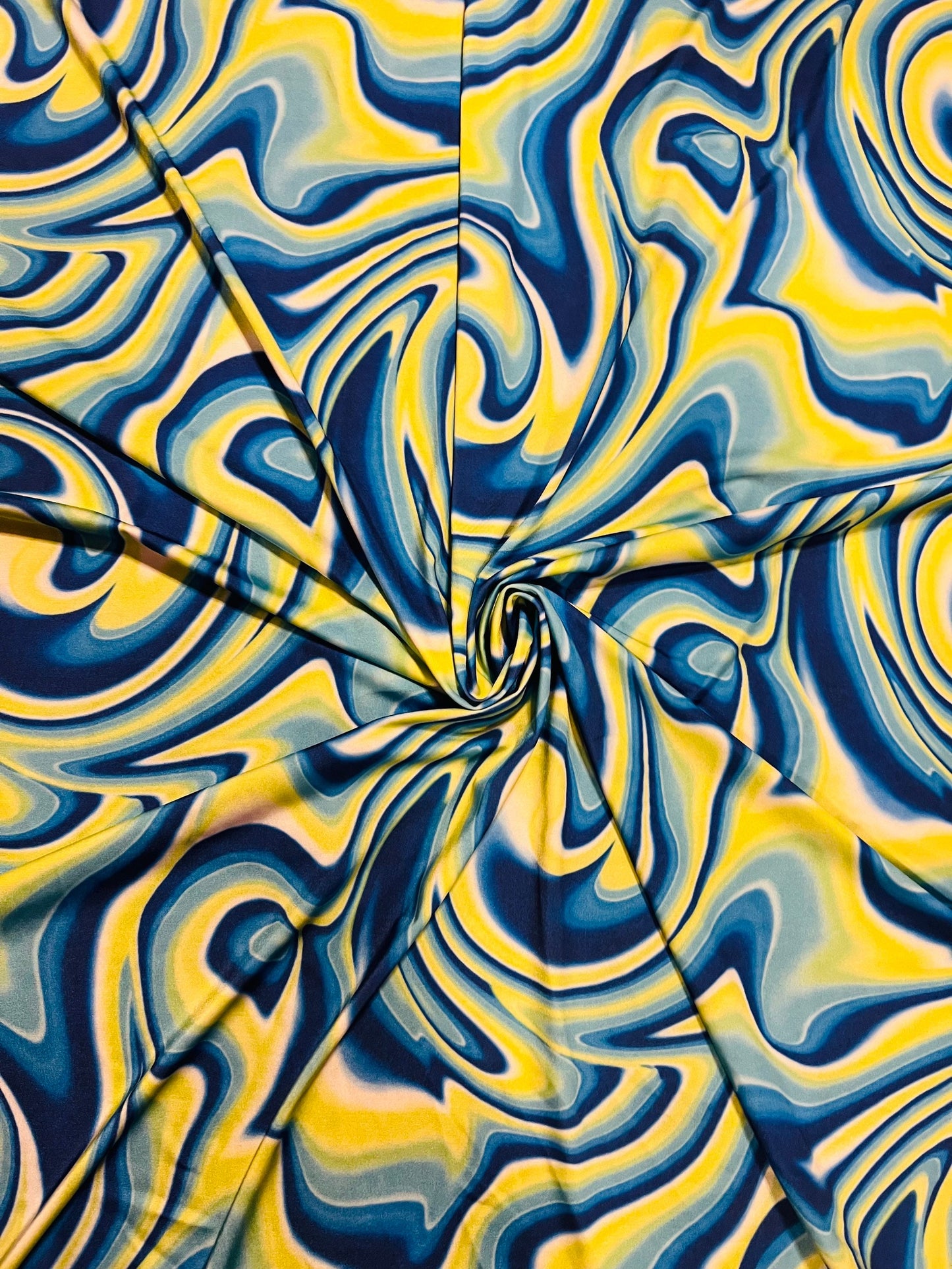 Abstract lava design yellow/blue/sapphire print on great quality of Nylon spandex 4-way stretch 58/60”