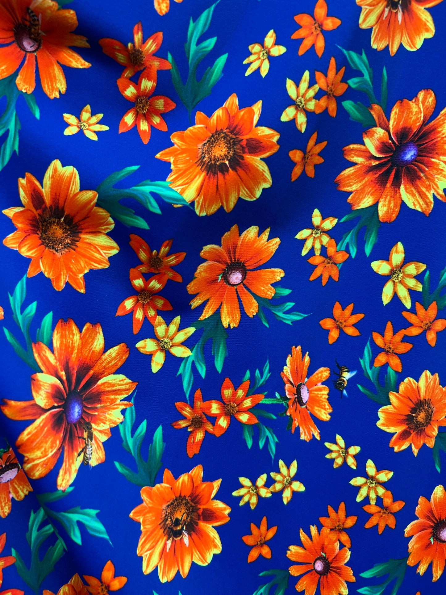 Floral romantic design sapphire/multi print Nylon spandex 4-way stretch 58/60” Sold by the YD. Ships worldwide from Los Angeles CA