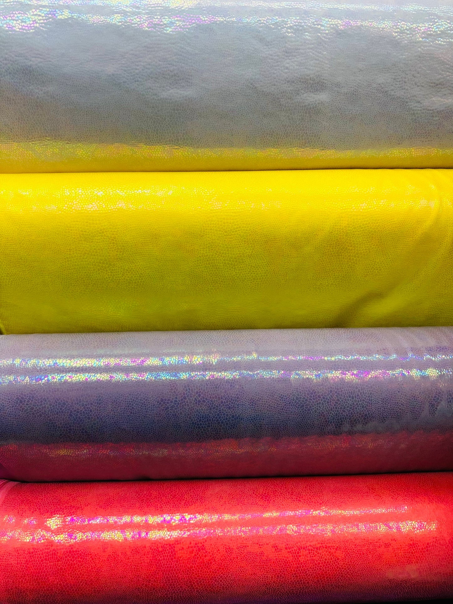 Iridescent exotic reptil design metallic hologram nylon spandex high quality 4-way stretch 58/60” Sold by the YD. Ships worldwide from L.A