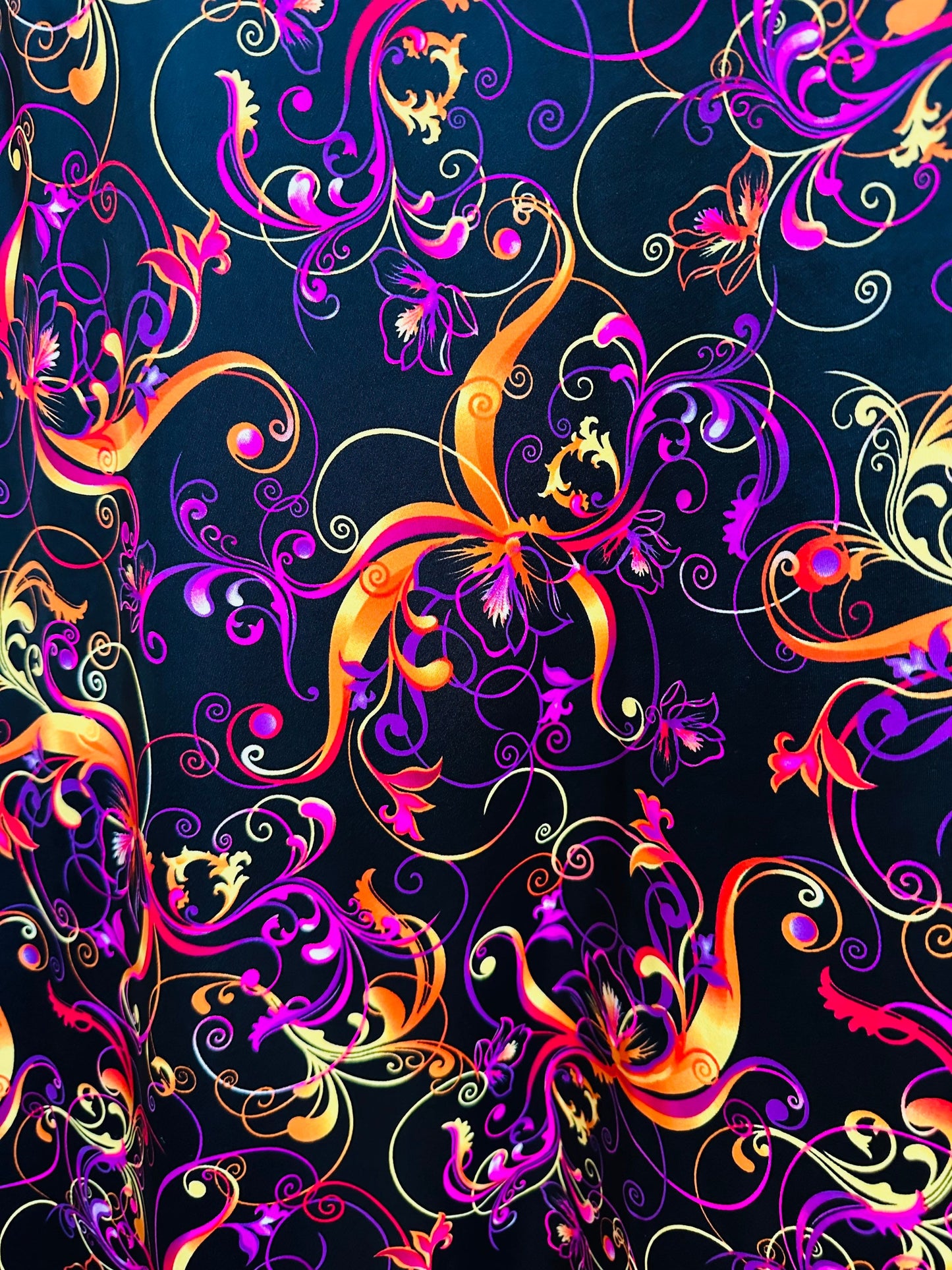 New Magic Flourish design Black/Multicolor Best quality of nylon spandex 4-way stretch 58/60” high quality spandex Sold by the YD.