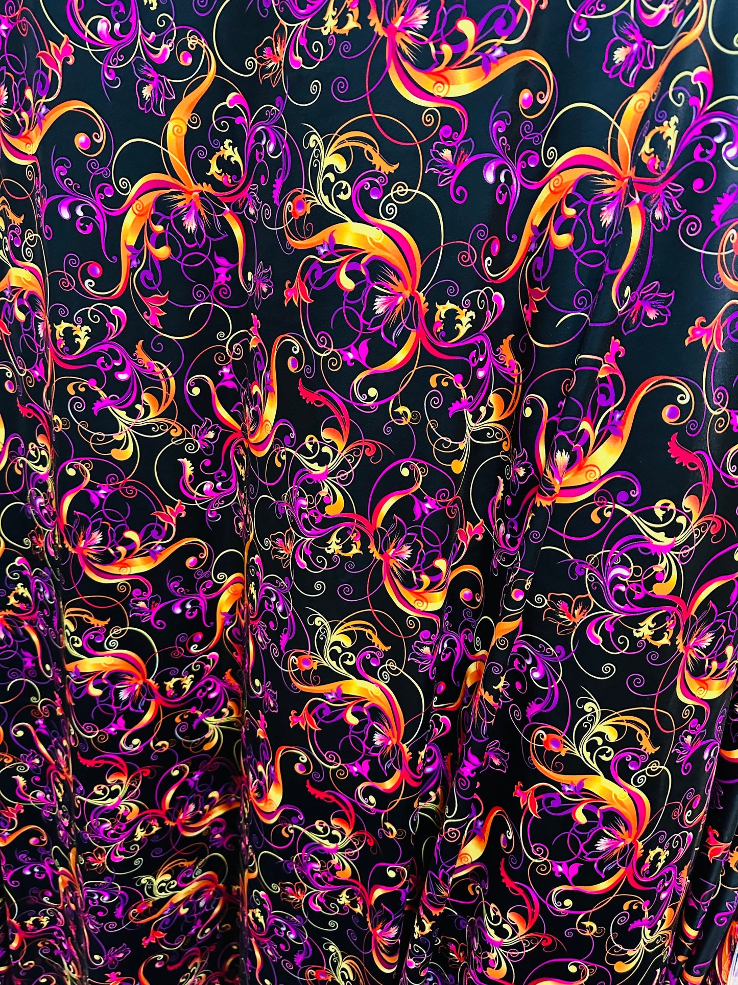 New Magic Flourish design Black/Multicolor Best quality of nylon spandex 4-way stretch 58/60” high quality spandex Sold by the YD.
