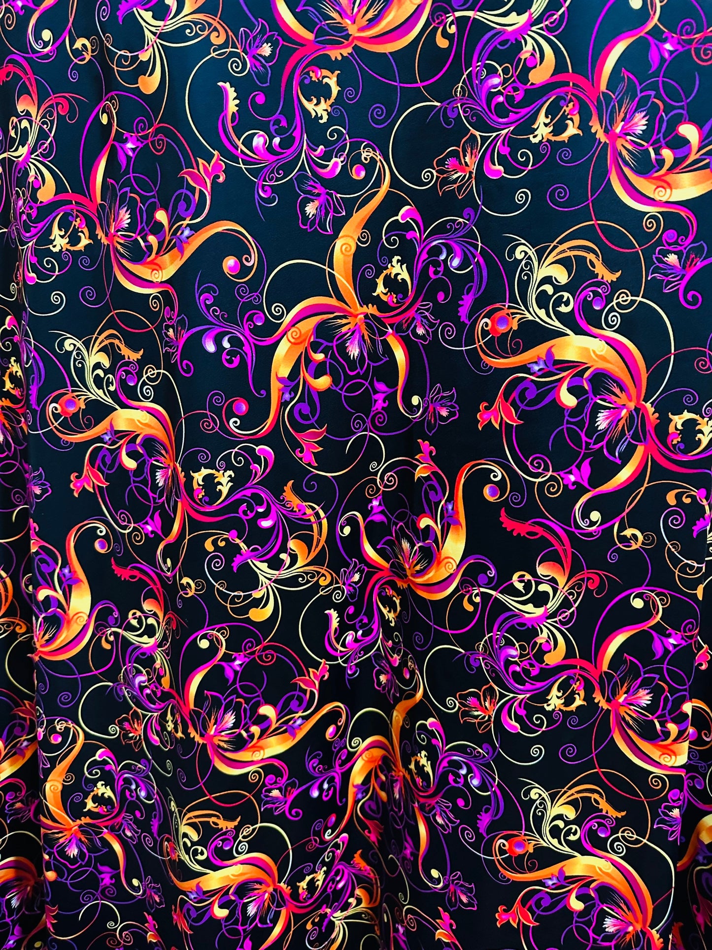 New Magic Flourish design Black/Multicolor Best quality of nylon spandex 4-way stretch 58/60” high quality spandex Sold by the YD.