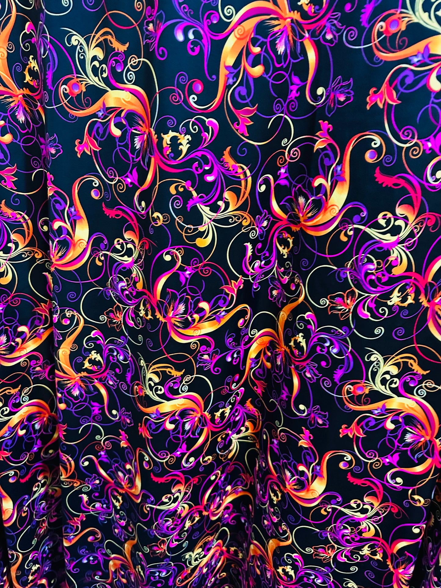 New Magic Flourish design Black/Multicolor Best quality of nylon spandex 4-way stretch 58/60” high quality spandex Sold by the YD.