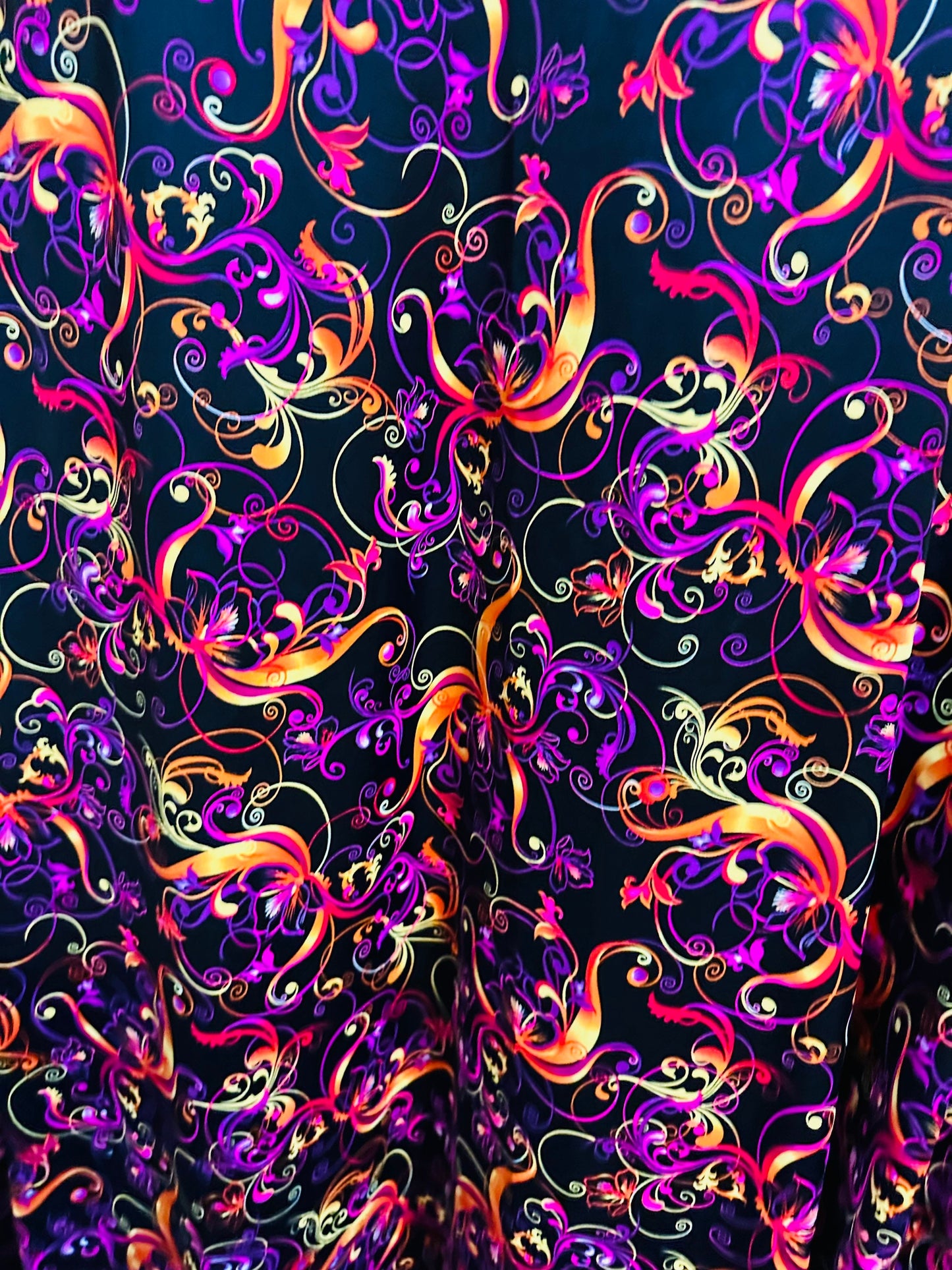 New Magic Flourish design Black/Multicolor Best quality of nylon spandex 4-way stretch 58/60” high quality spandex Sold by the YD.