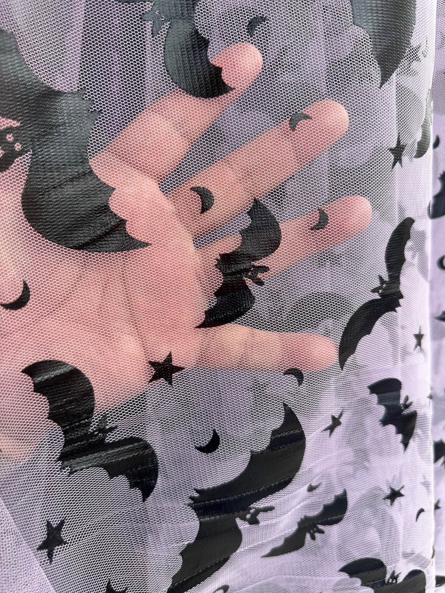 New Halloween metallic poly mesh skulls and bats design 2-way stretch 58/60”