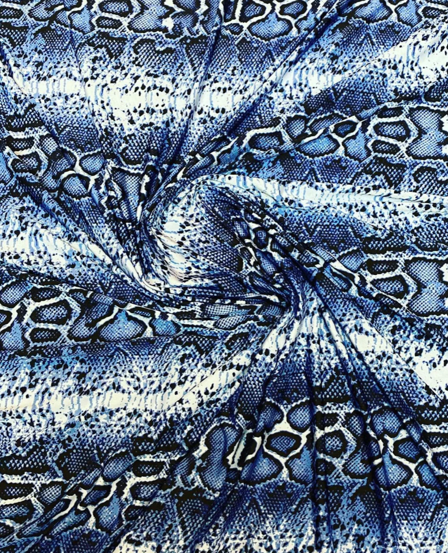 New snake skin sapphire/blue color print on poly spandex light weight 4-way stretch 58/60”