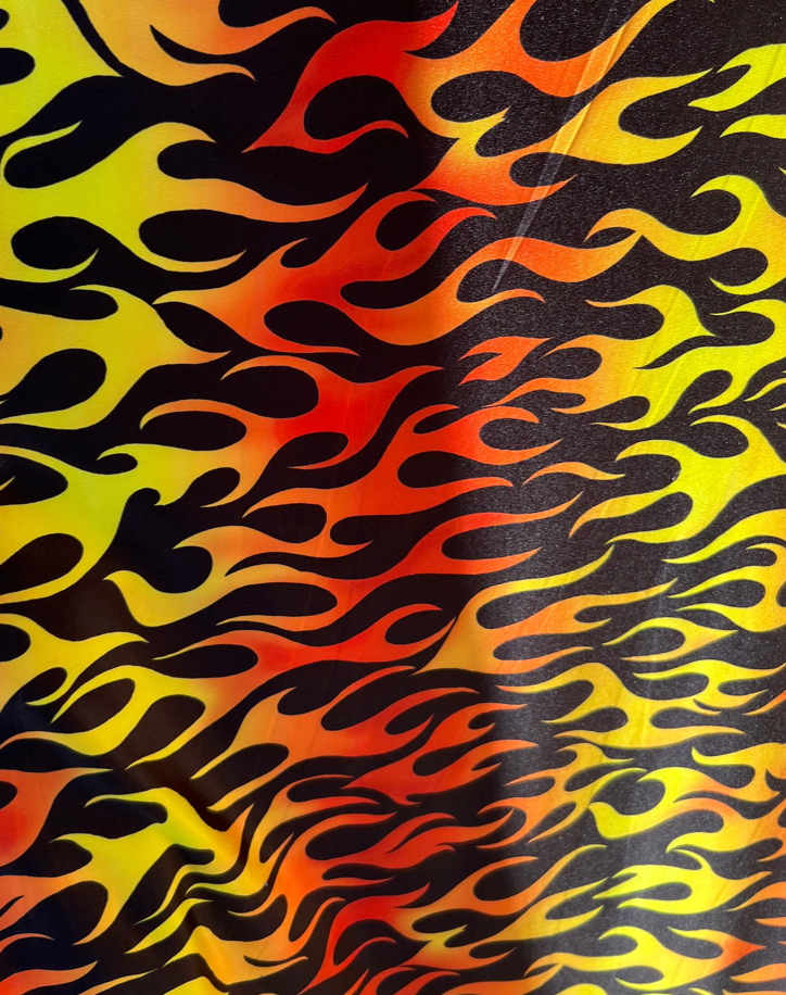 New Flame design Black/Fire color print on light weight poly spandex 2-way stretch 58/60”