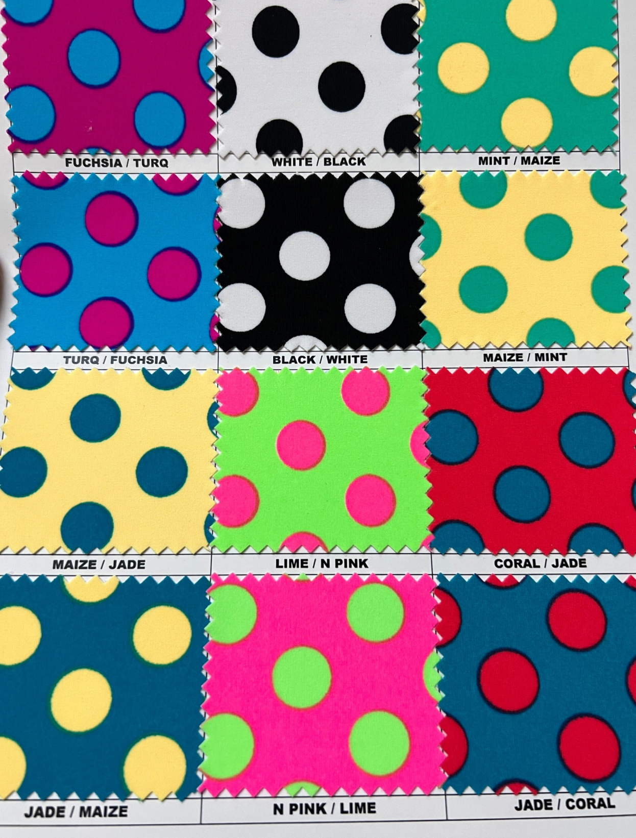 Polka dots design print on best quality of Matte nylon spandex 4-way stretch 58/60”