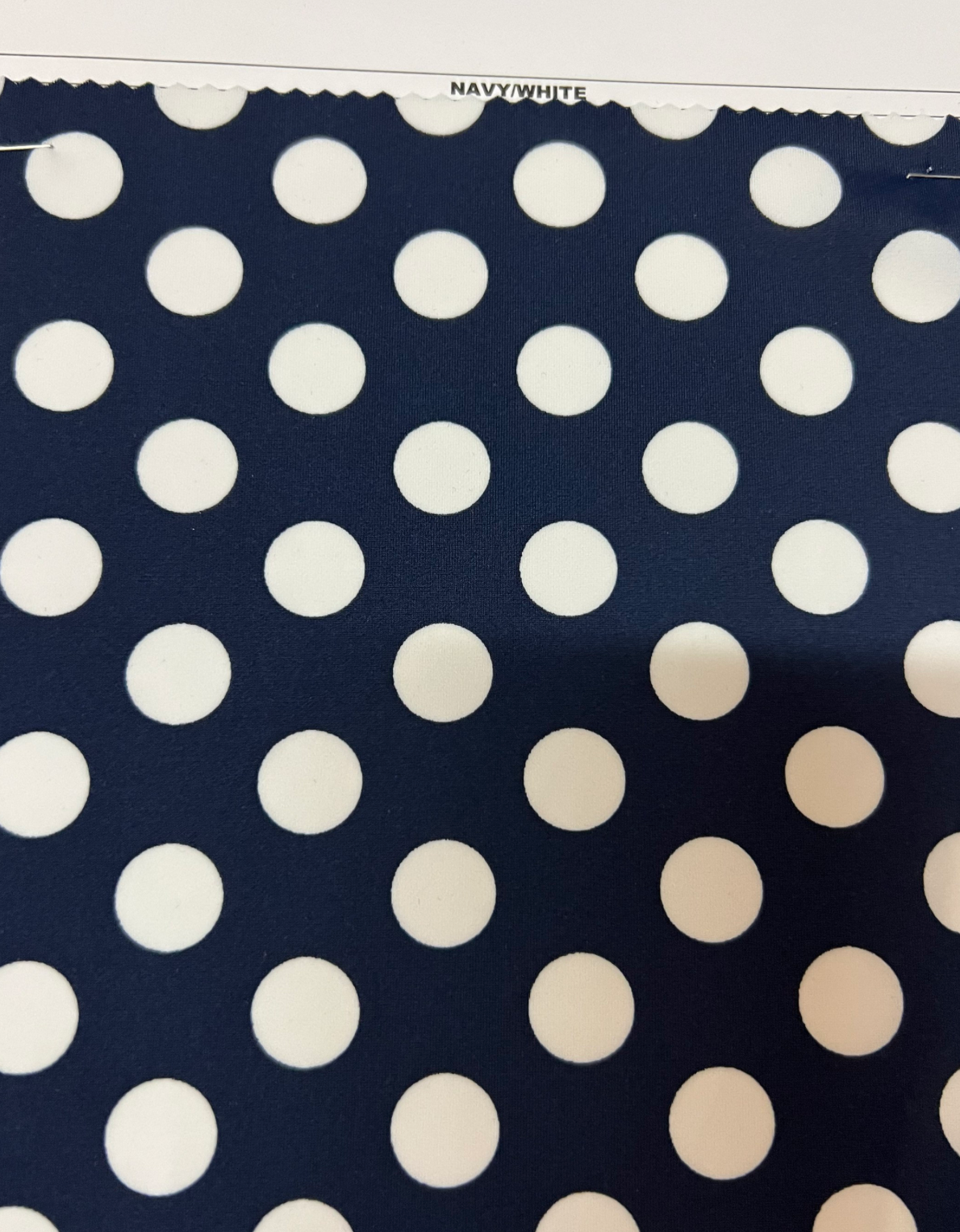 Polka dots design print on best quality of Matte nylon spandex 4-way stretch 58/60”