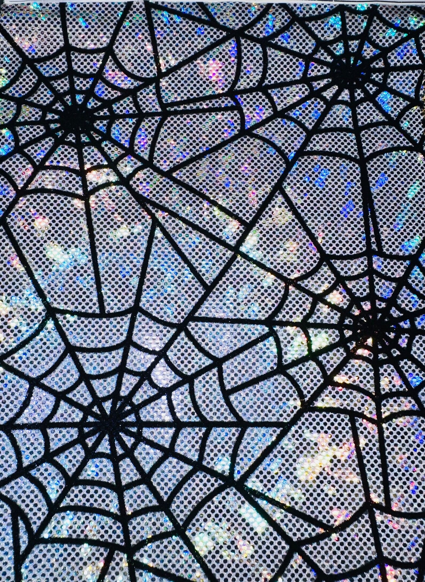 Amazing Spiderweb design on metallic hologram shattered glass nylon spandex with flocking 4-way stretch 58/60”