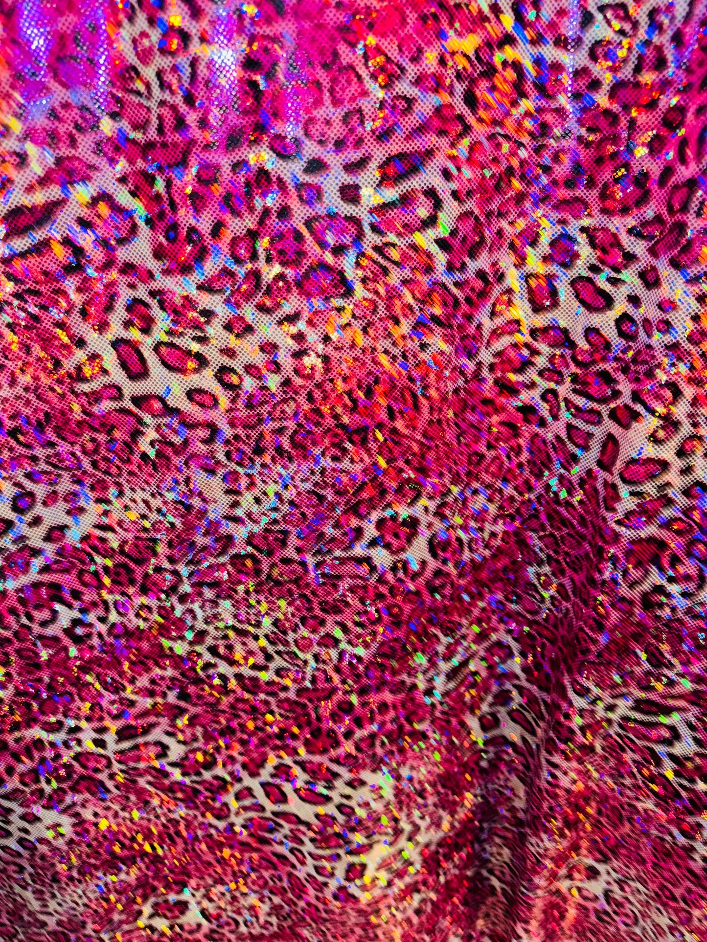 New Wild Leopard design on Hologram metallic nylon spandex 4-way stretch 58/60”