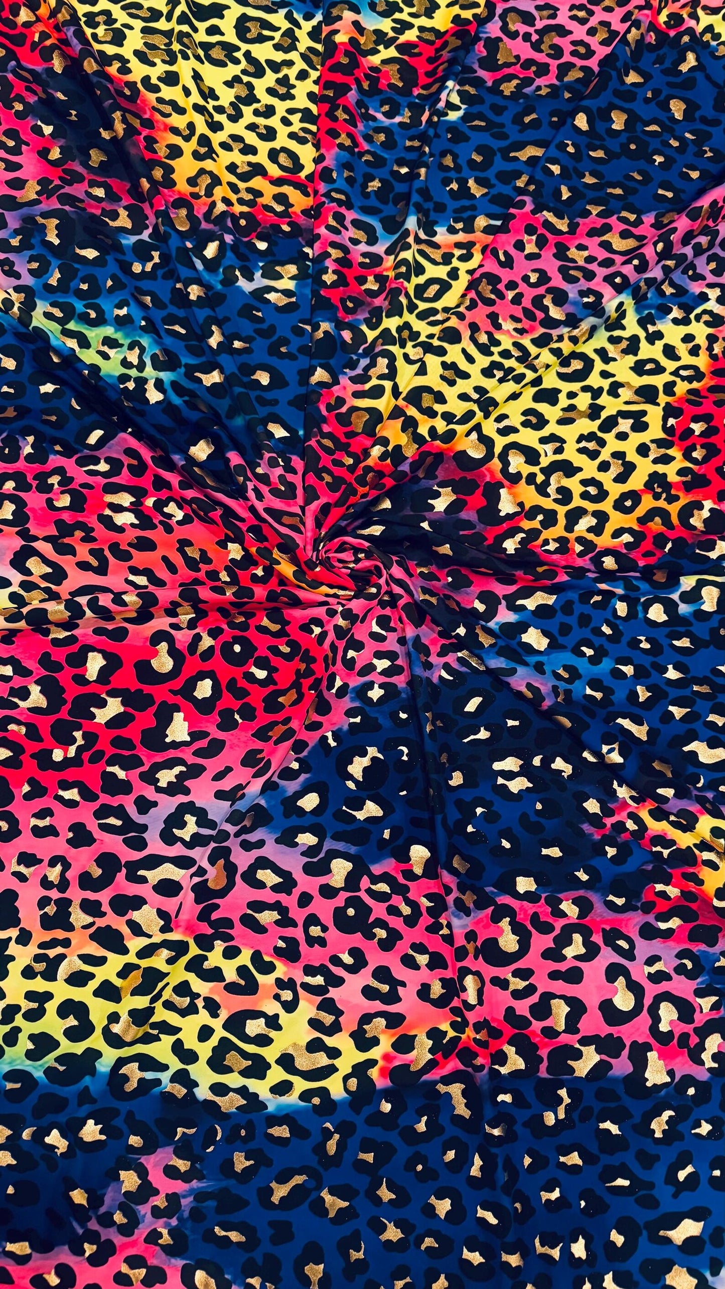 New exotic metallic leopard design nylon spandex 4-way stretch it glows in the dark 58/60” Sold by the YD. Ships worldwide from Los Angeles