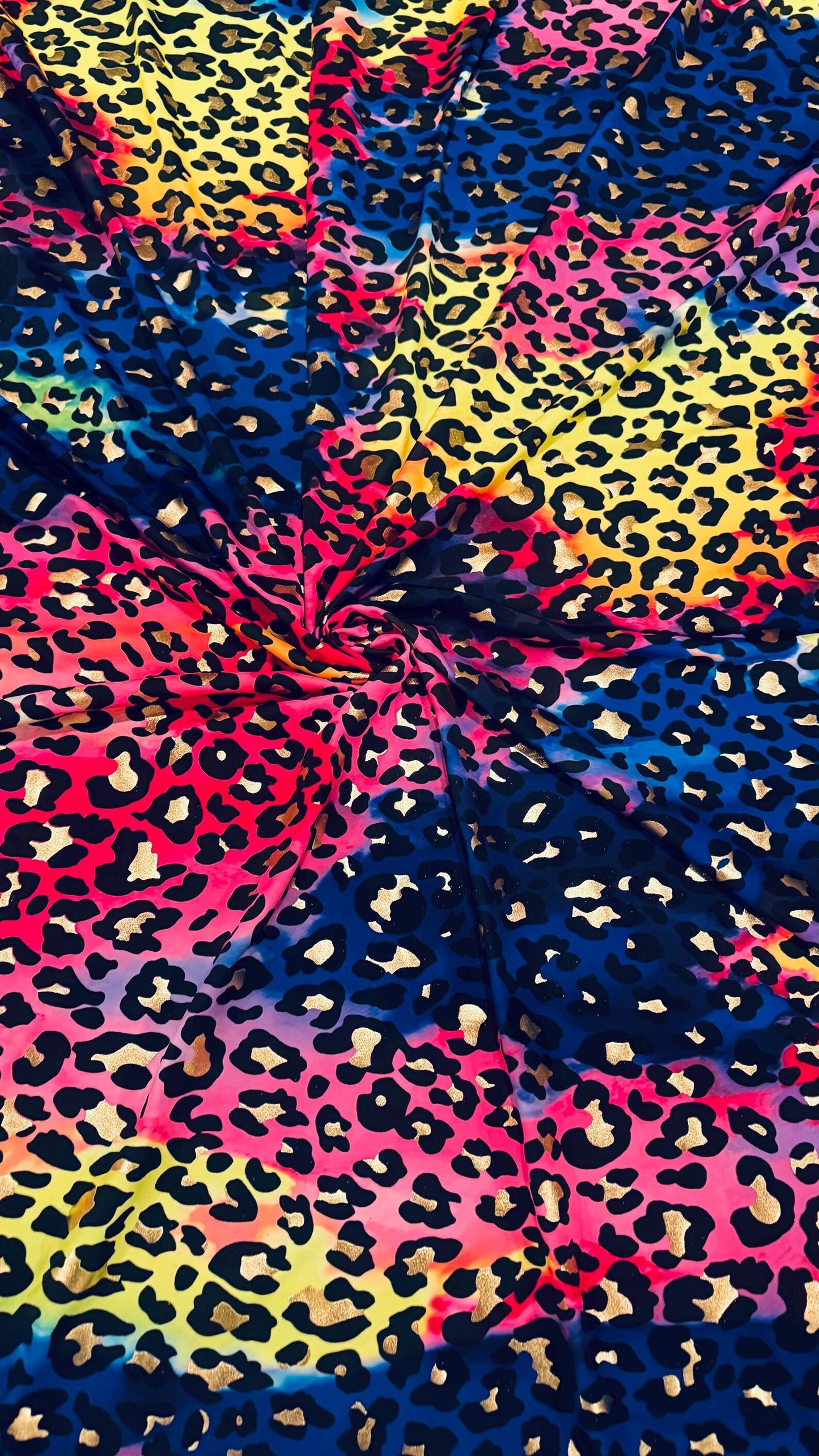 New exotic metallic leopard design nylon spandex 4-way stretch it glows in the dark 58/60” Sold by the YD. Ships worldwide from Los Angeles