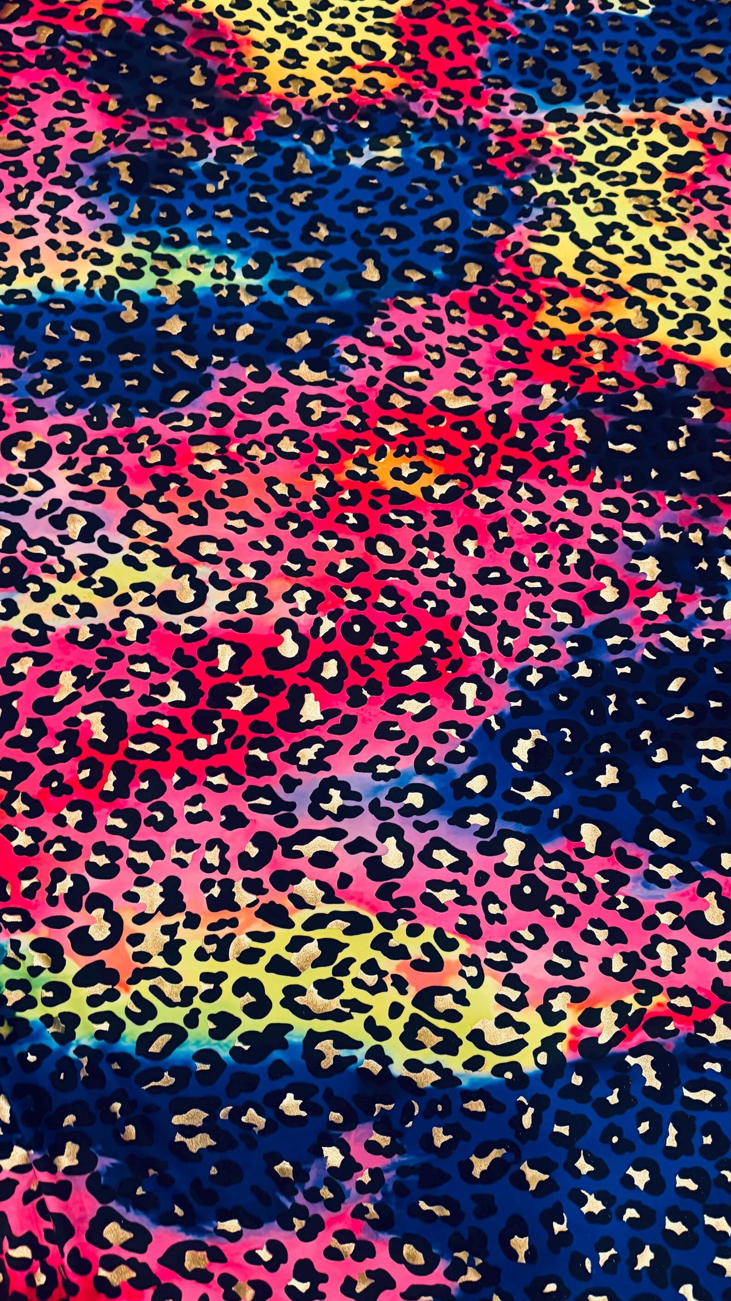 New exotic metallic leopard design nylon spandex 4-way stretch it glows in the dark 58/60” Sold by the YD. Ships worldwide from Los Angeles