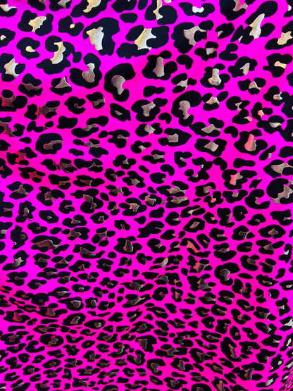 Metallic Exotic leopard design Pink/Gold it glows in the dark with black light best quality of nylon spandex 4-way stretch 58/60”