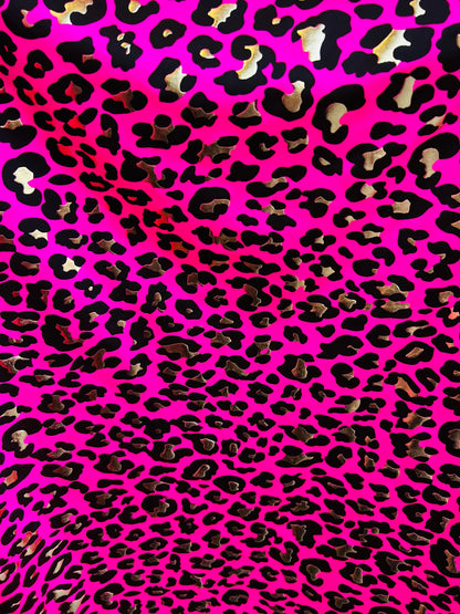 Metallic Exotic leopard design Pink/Gold it glows in the dark with black light best quality of nylon spandex 4-way stretch 58/60”