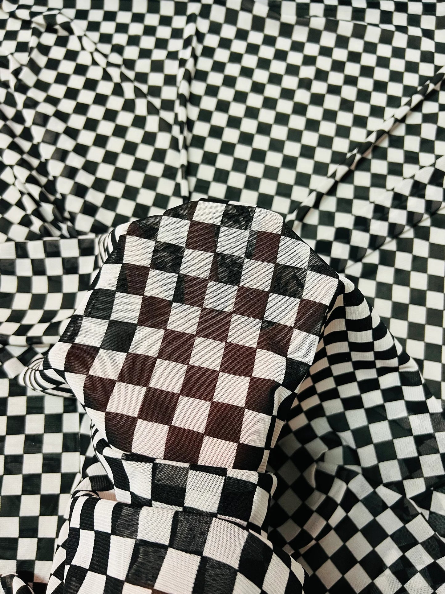 Checkers design White/Black print on great quality of power mesh 2-way stretch 58/60”