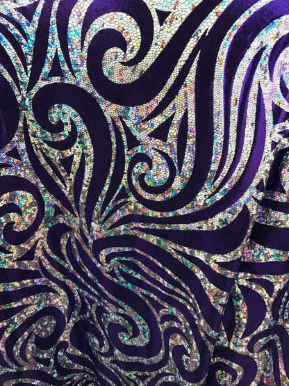 Metallic spandex with swirl hologram foil design 58/60" sold by the yd. Ships worldwide from Los Angeles CA United States.