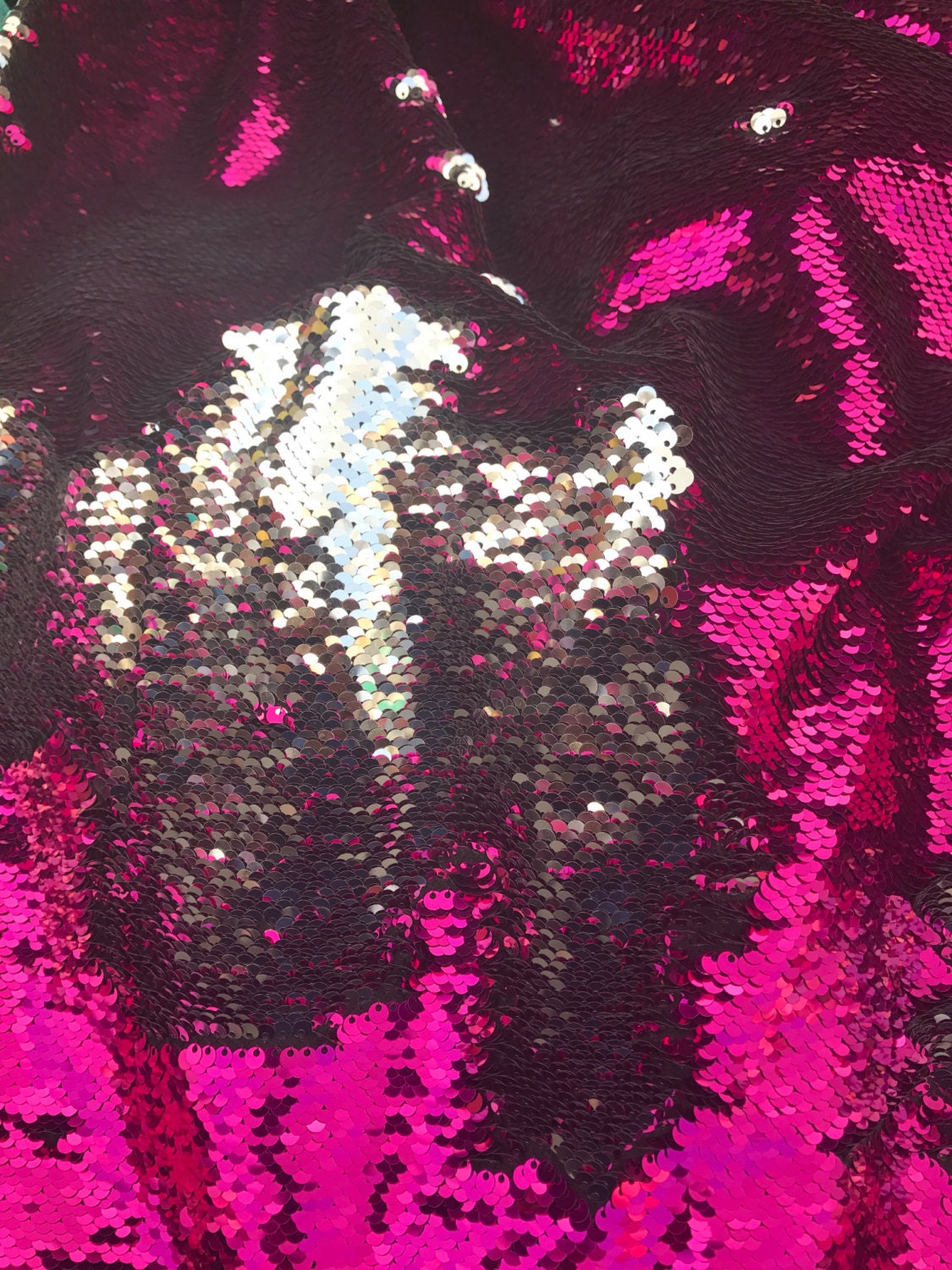 Flip up mermaid sequins with spandex base 58/60" sold by the yd. available by full roll. Ships from Los Angeles CA United States