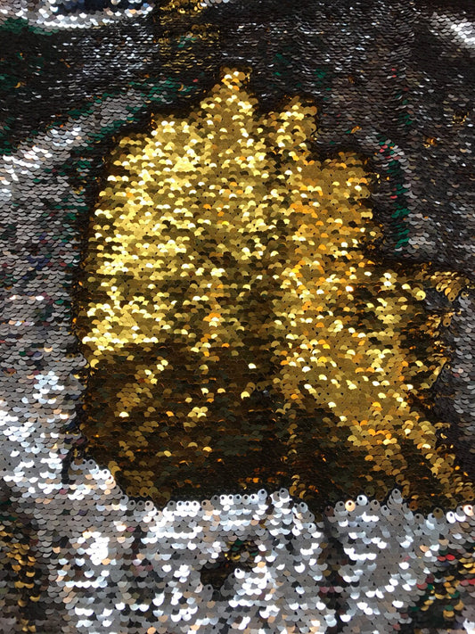 Flip up sequins gold/silver reversible 2 tone sequins with spandex base 58/60" sold by the yd. ships worldwide from Los Angeles California.