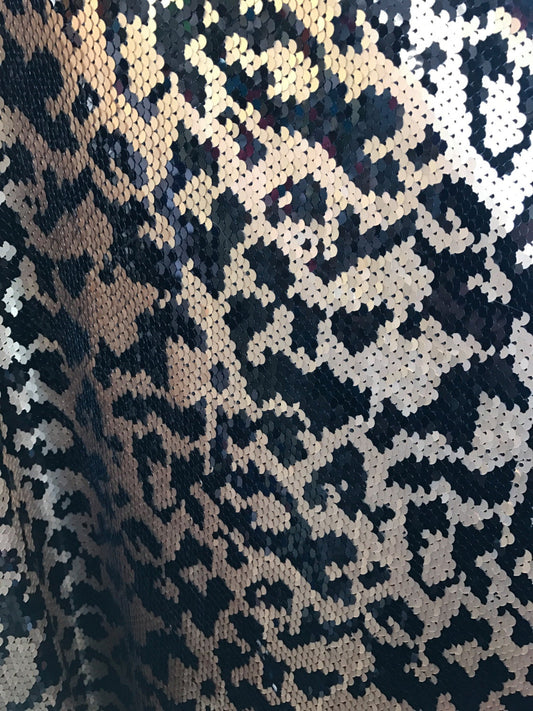 Animal print 5mm sequins 58/60" on Lycra base 2way stretch. Sold by the yd. Ships worldwide from Los Angeles California USA
