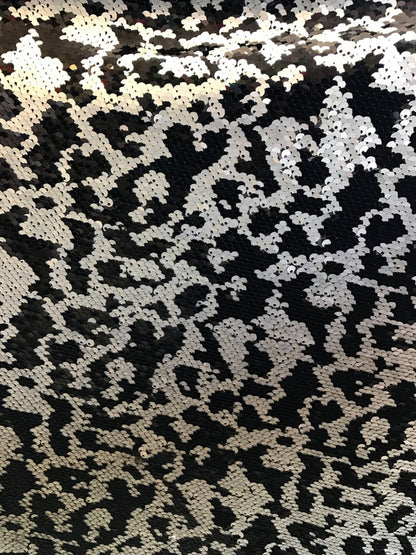 Animal print 5mm sequins 58/60" on Lycra base 2way stretch. Sold by the yd. Ships worldwide from Los Angeles California USA