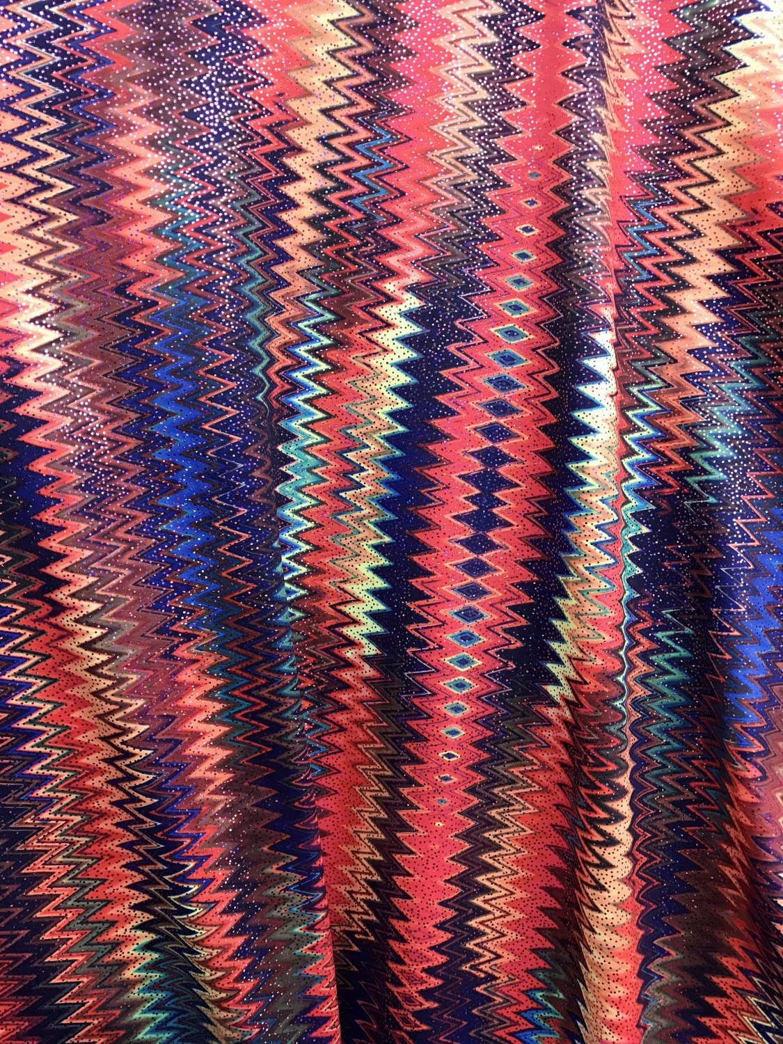 Zigzag tie dye print design on nylon spandex 4way stretch 58/60" sold by the yd. Ships worldwide from Los Angeles California USA