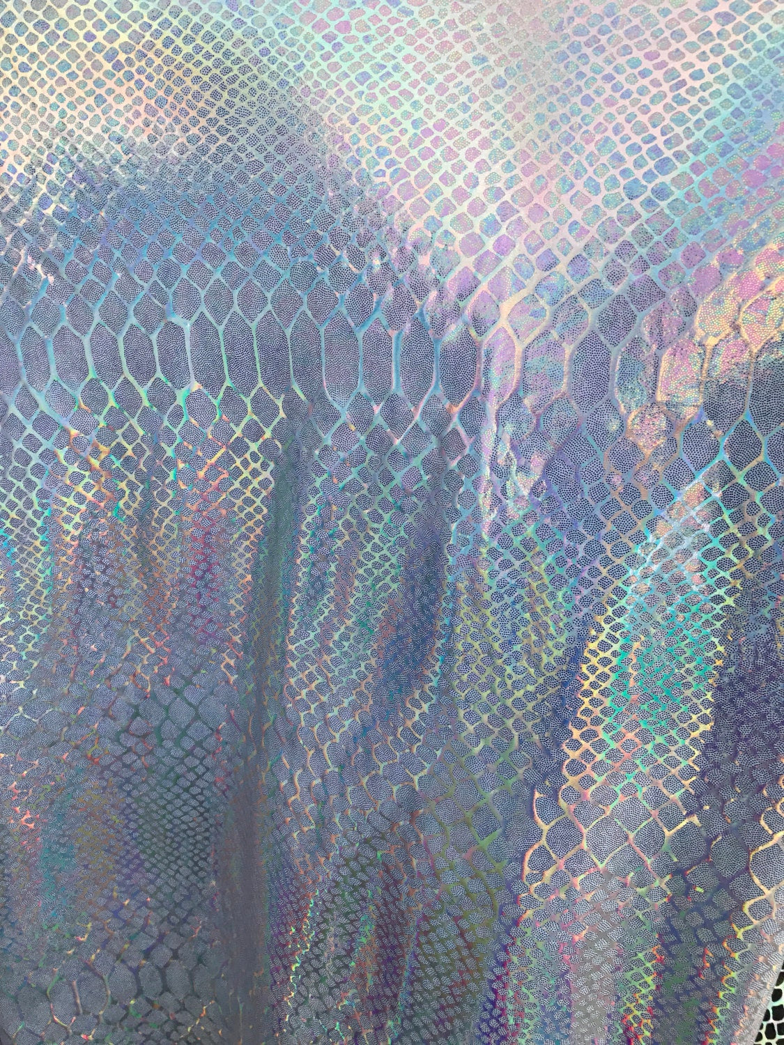 New nylon spandex COBRA design with iridescent hologram foil 4 Way Stretch 58/60" Sold by the yd. Ships worldwide from Los Angeles CA USA