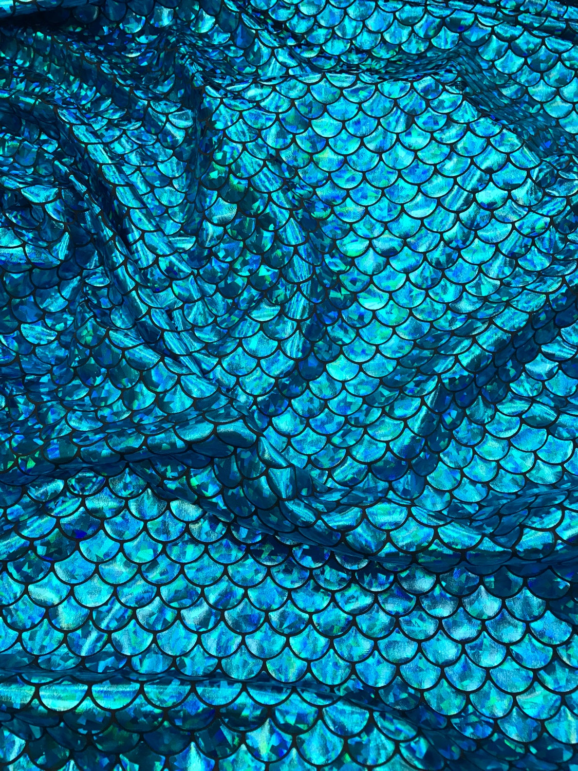 Medium mermaid fish scales with hologram foil  nylon spandex 4way Stretch 58/60" Sold by the yd. Ships worldwide from Los Angeles California