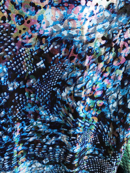 Hologram snake design with ilusión foil all over nylon spandex 4way Stretch 58/60" Sold by the YD. Ships worldwide from Los Angeles CA, USA