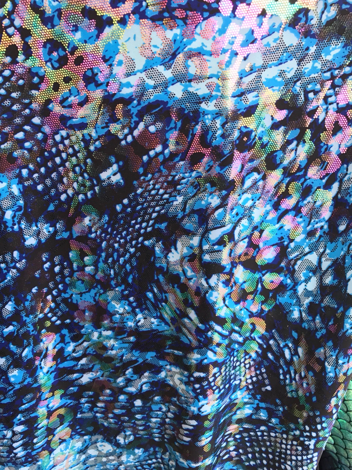 Hologram snake design with ilusión foil all over nylon spandex 4way Stretch 58/60" Sold by the YD. Ships worldwide from Los Angeles CA, USA