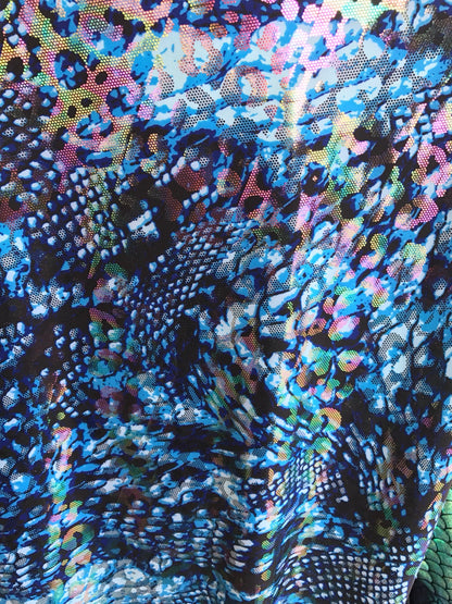 Hologram snake design with ilusión foil all over nylon spandex 4way Stretch 58/60" Sold by the YD. Ships worldwide from Los Angeles CA, USA