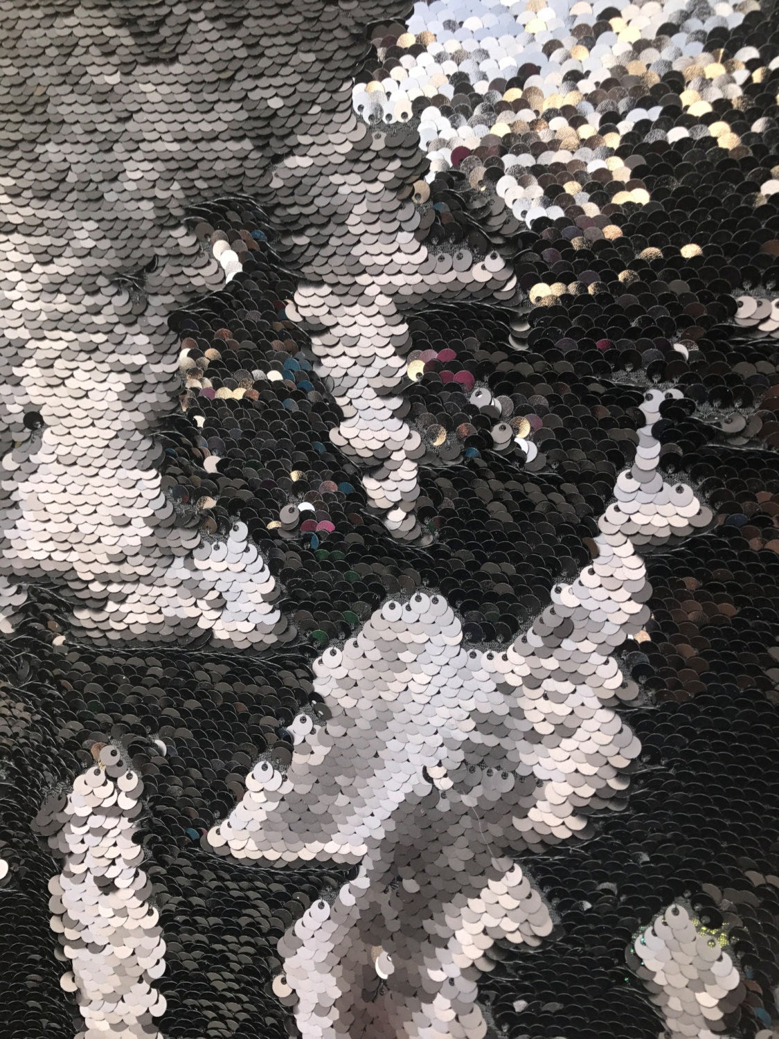 Flip up mermaid sequins with spandex base 58/60" sold by the yd. available by full roll. Ships from Los Angeles CA United States