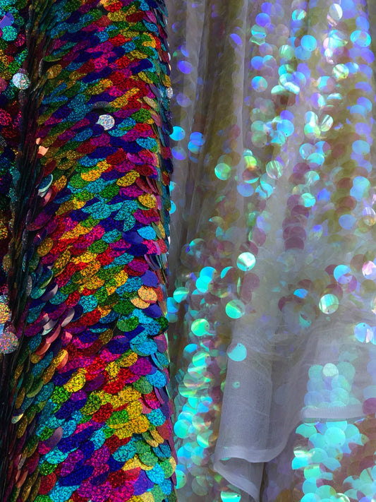 Paillette circle iridescent and multi sequins on stretch mesh base. Sold by the yd ships worldwide from Los Angeles CA