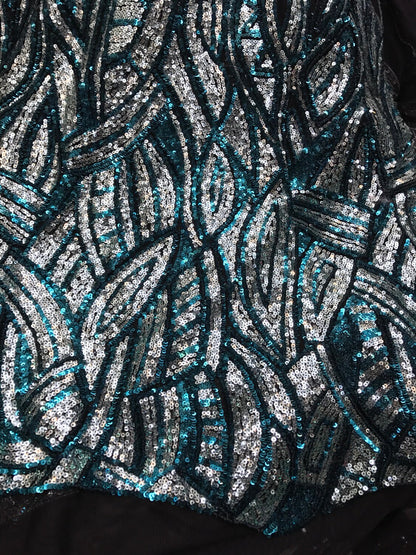 Peacock/silver glitz sequins Leaf Design one side border with mesh base 2way 54/55" Sold by the YD. Ships worldwide from Los Angeles CA, US